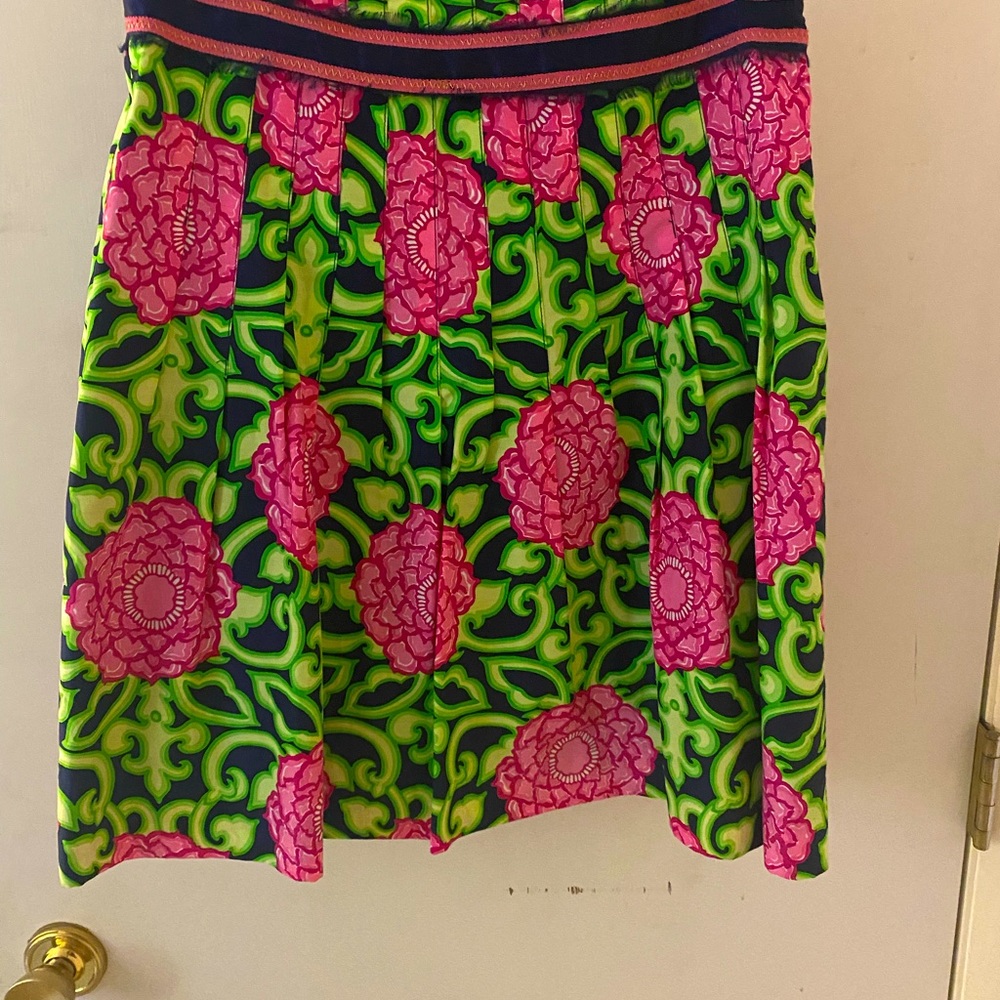 Lilly Pulitzer pleated, knee length skirt.
